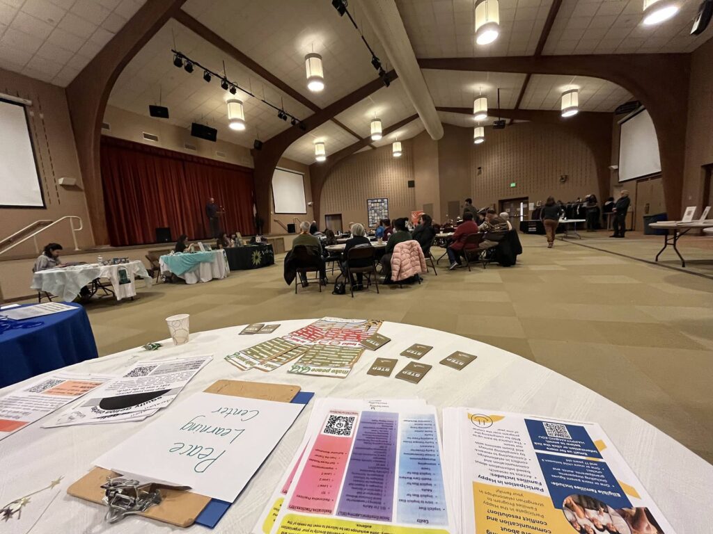 Room with tables set up for event